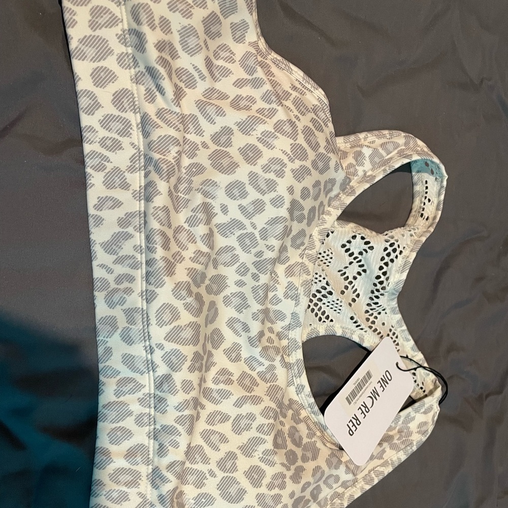 Brand new Zyia Ivory leopard bomber sports bra
